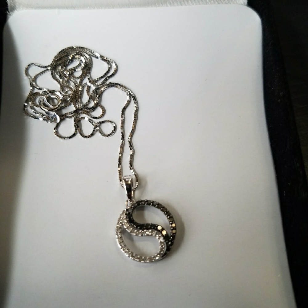 White gold and diamond yin yang necklace